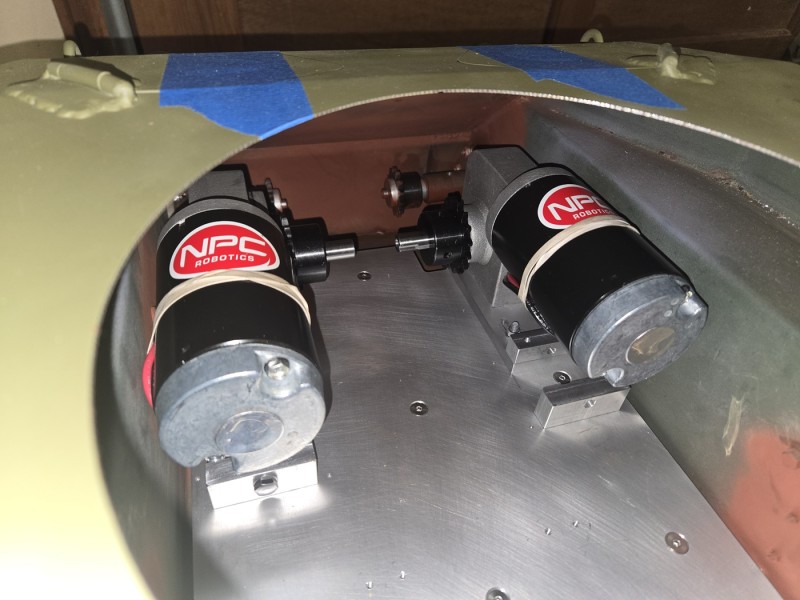 Motor installation with chain sprockets